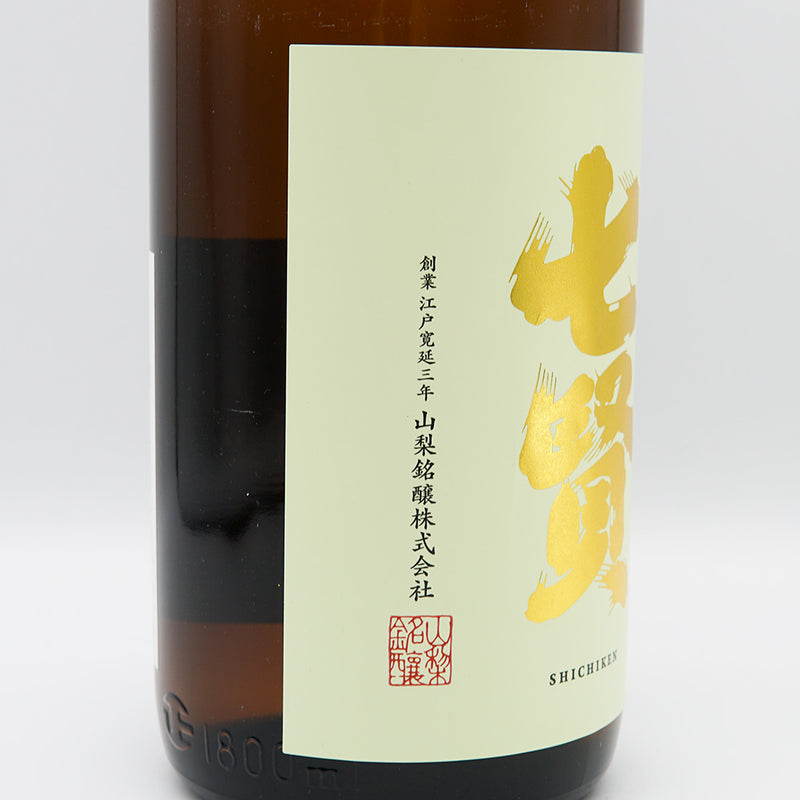 七賢 甘酸辛苦渋 本醸造のラベル左側面